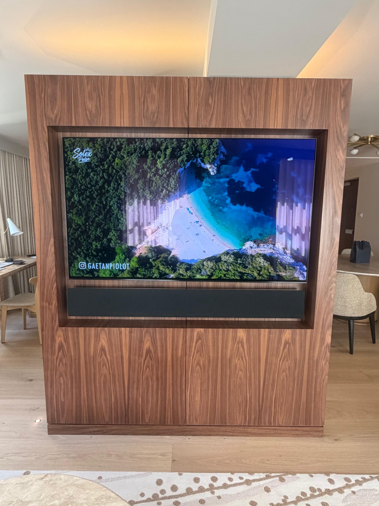 Television mounted in a freestanding timber feature wall