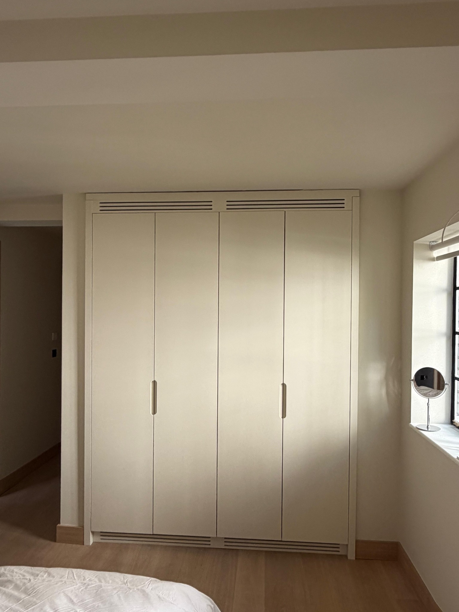 White painted fitted wardrobes