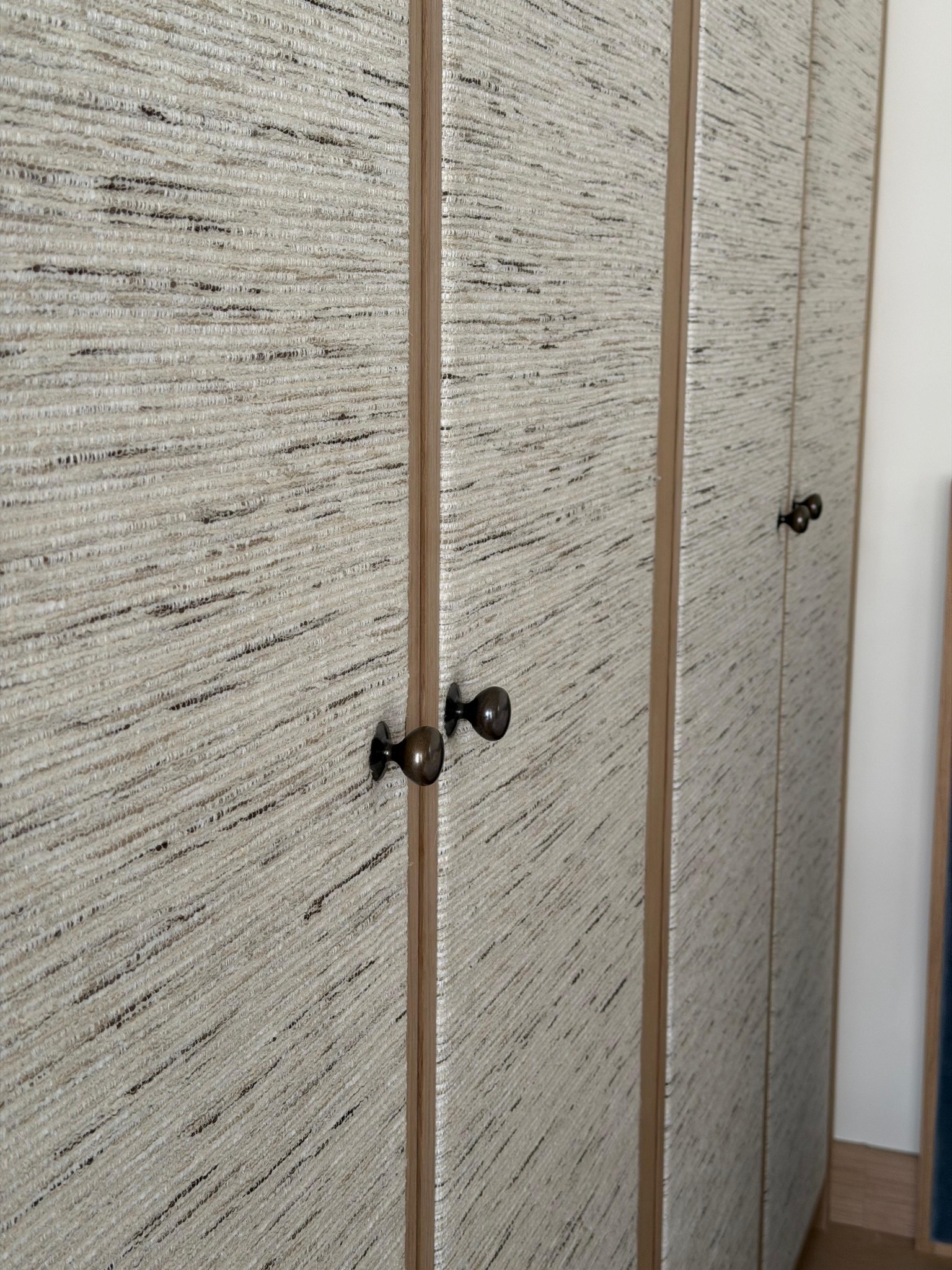 Close view of textured wardrobe door panels